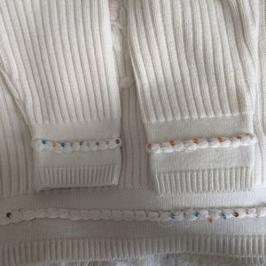 Thrifted sweater with beaded embroidery and lace detail!